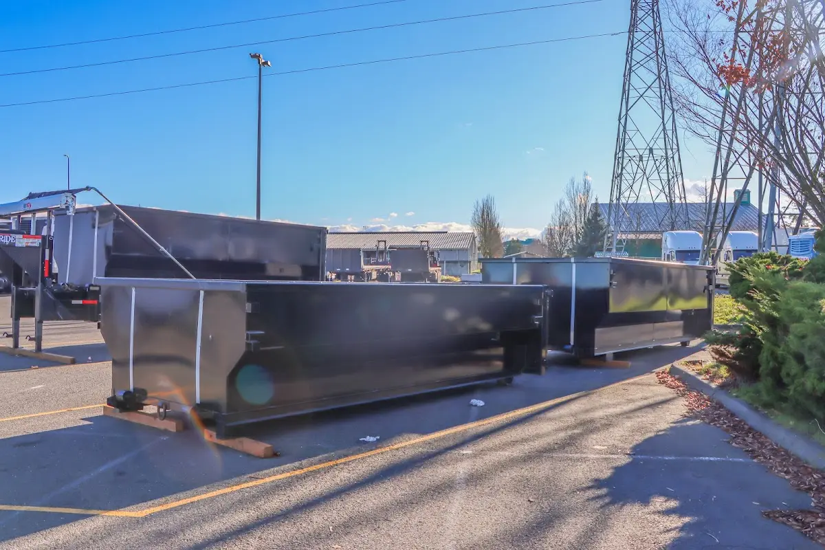 Roll-off dumpster ready for waste disposal at job site for 2 Yard Dumpster Rental in Peoria Heights